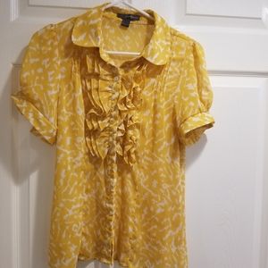 Yellow see through blouse.
